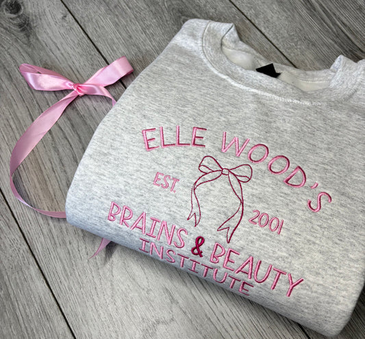 ELLE WOODS BRAINS & BEAUTY INSTITUTE EMBROIDERED SWEATSHIRT