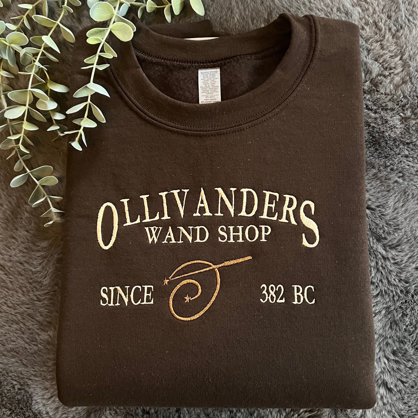 OLLIVANDERS WAND SHOP EMBROIDERED SWEATSHIRT