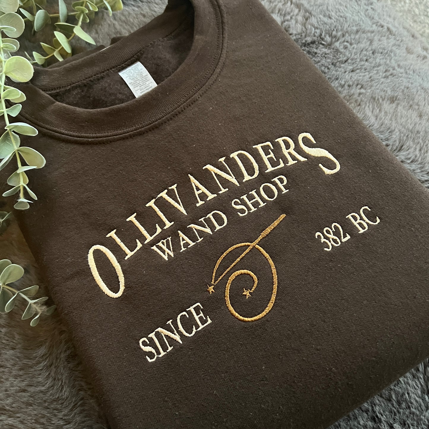 OLLIVANDERS WAND SHOP EMBROIDERED SWEATSHIRT