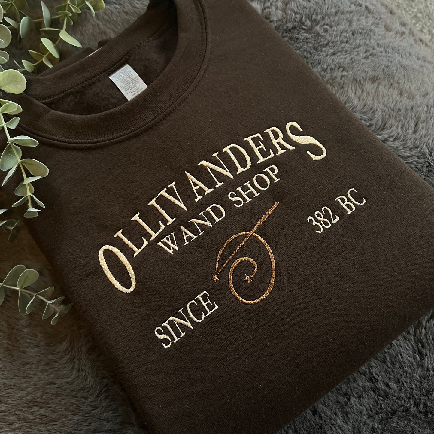 OLLIVANDERS WAND SHOP EMBROIDERED SWEATSHIRT
