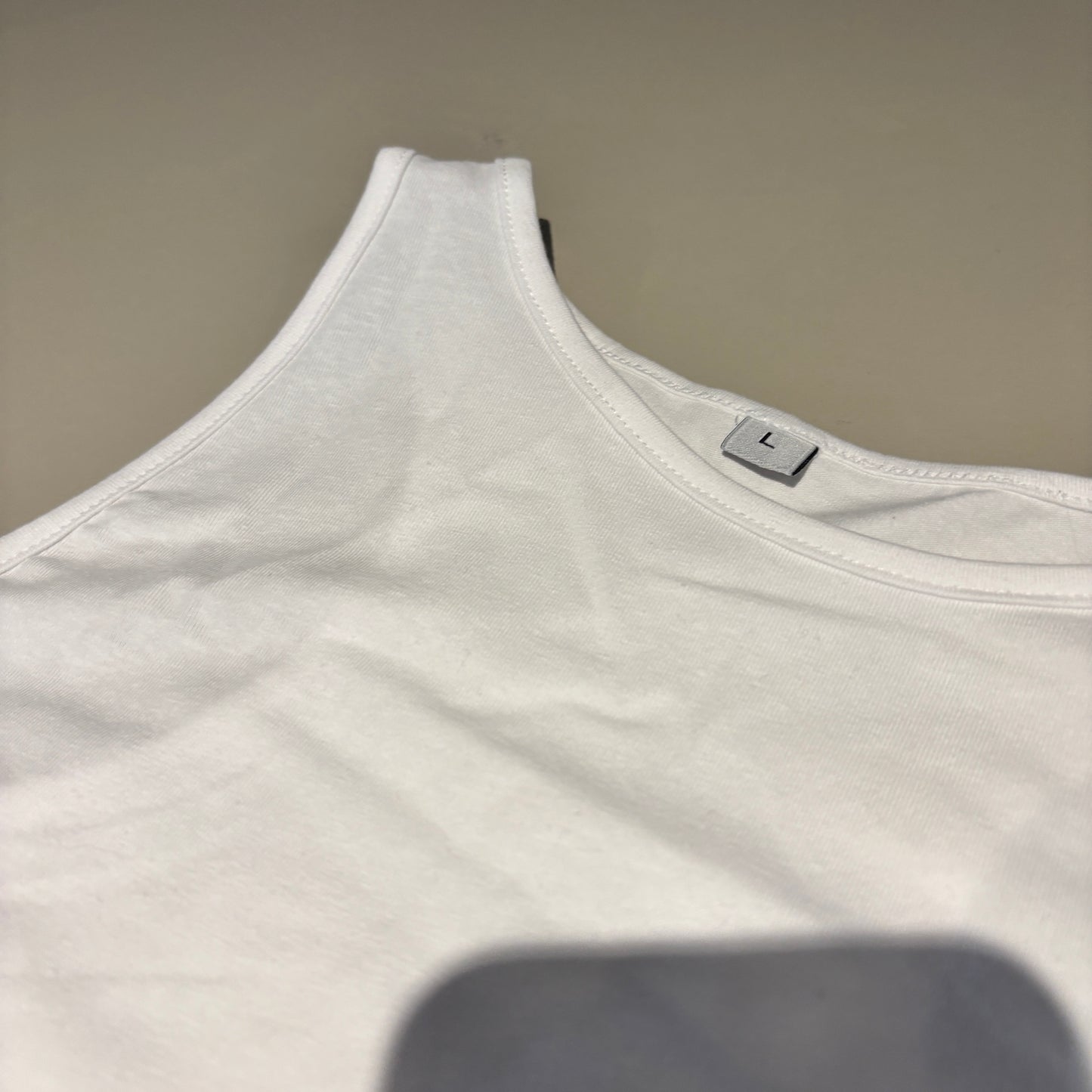 LARGE WHITE TANK TOP (STRETCH) EXPENSIVE & DIFFICULT