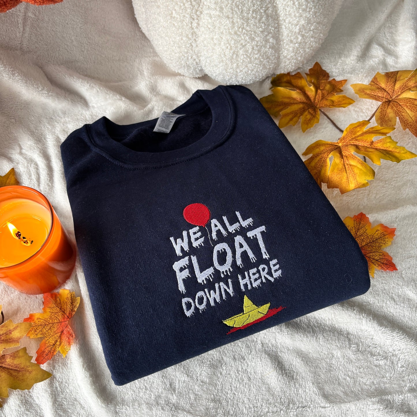WE ALL FLOAT EMBROIDERED SWEATSHIRT