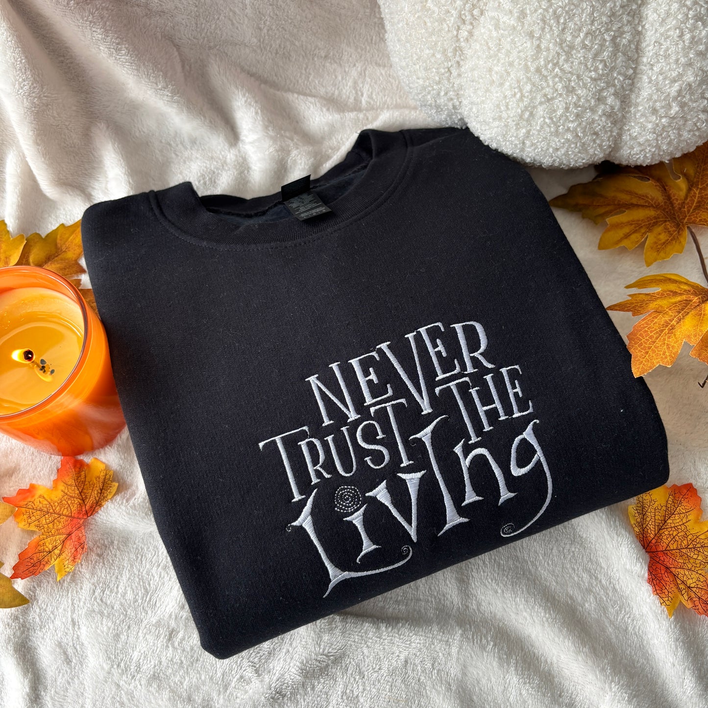 NEVER TRUST THE LIVING EMBROIDERED SWEATSHIRT