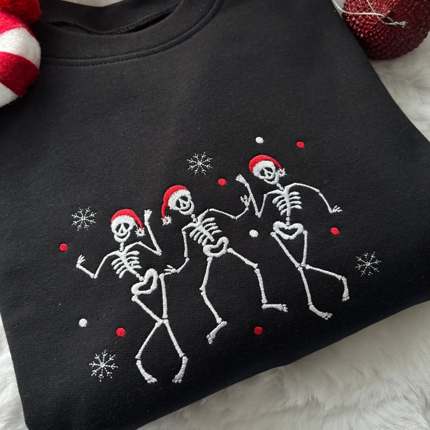 CHRISTMAS DANCING SKELETONS EMBROIDERED SWEATSHIRT