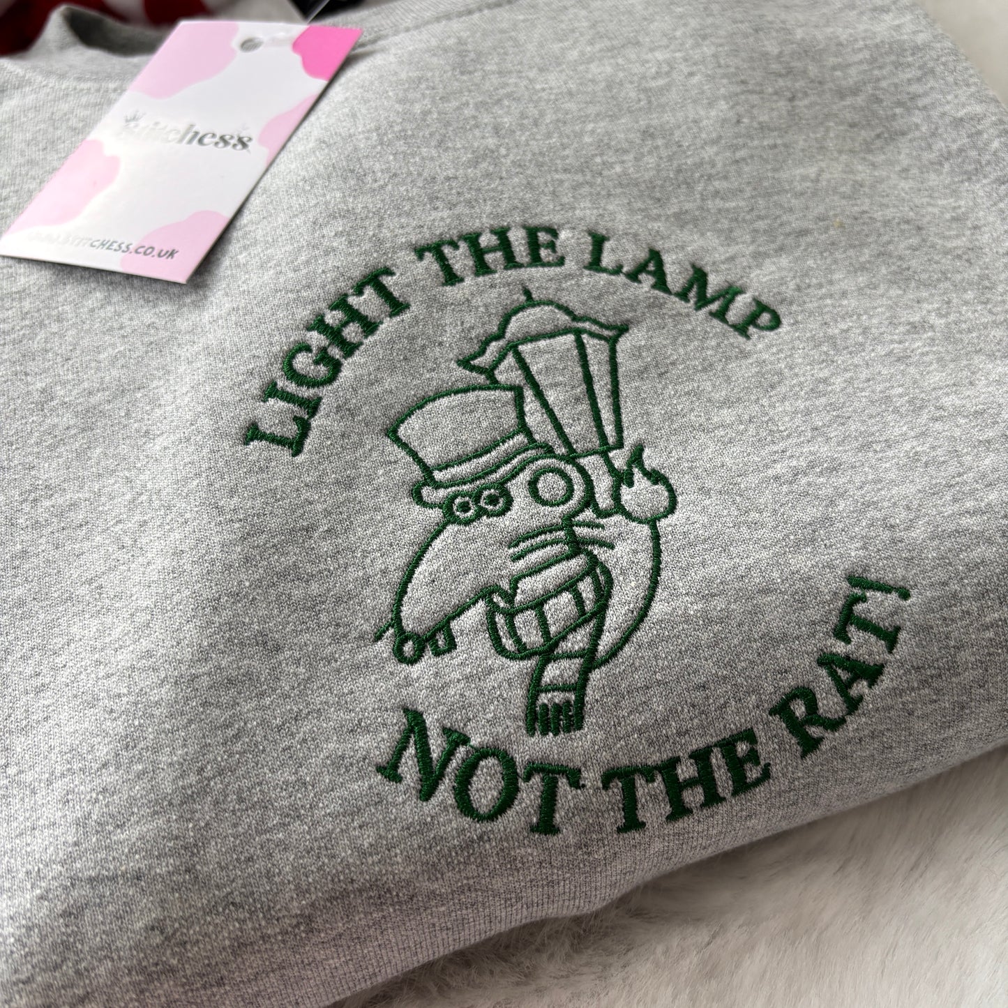 LIGHT THE LAMP NOT THE RAT! EMBROIDERED SWEATSHIRT
