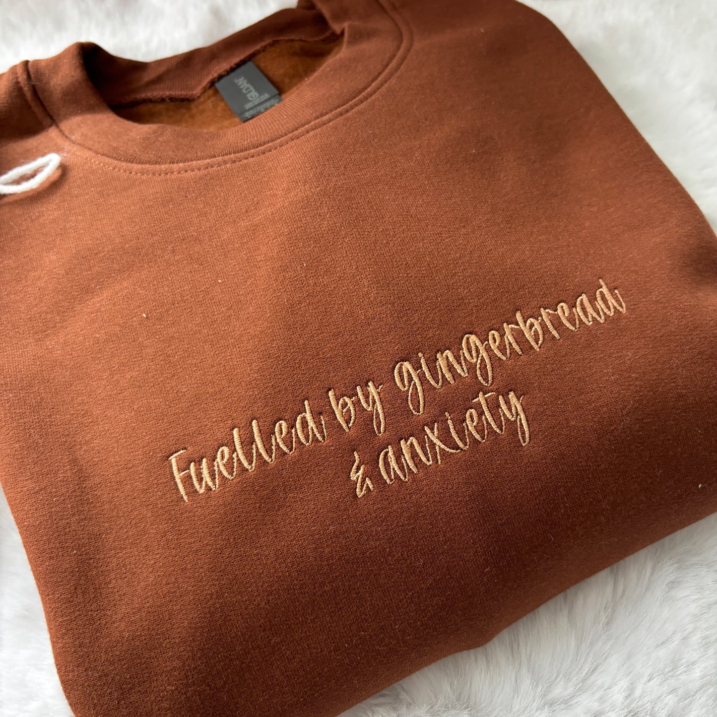 FUELLED BY GINGERBREAD & ANXIETY EMBROIDERED SWEATSHIRT