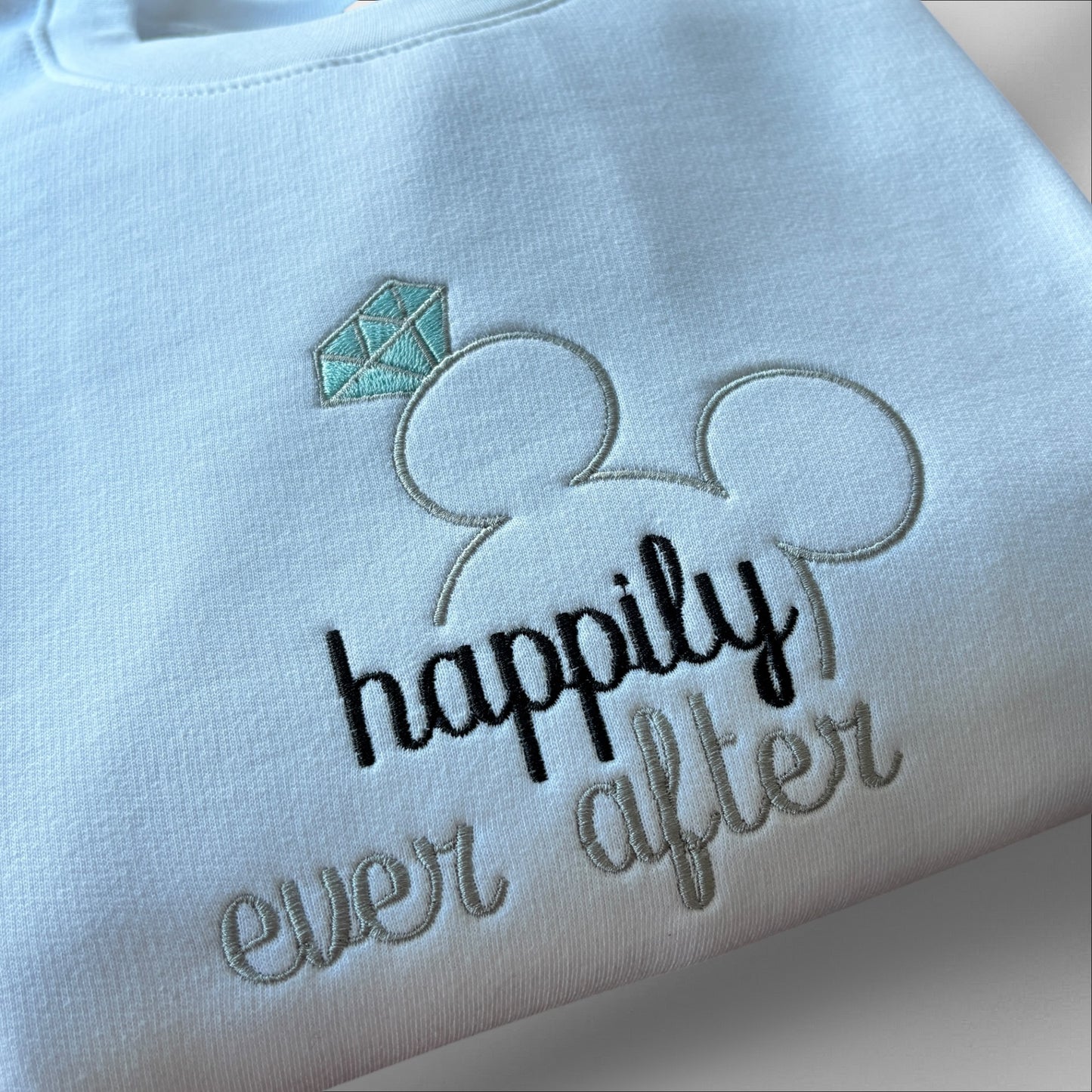HAPPILY EVER AFTER EMBROIDERED SWEATSHIRT
