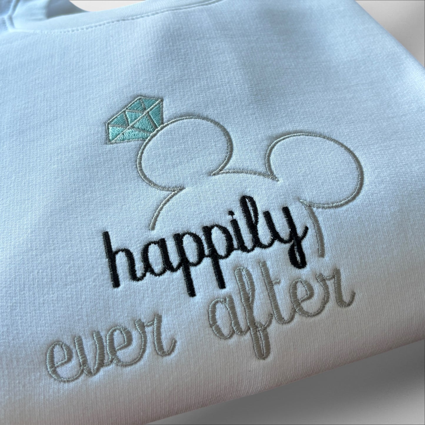 HAPPILY EVER AFTER EMBROIDERED SWEATSHIRT