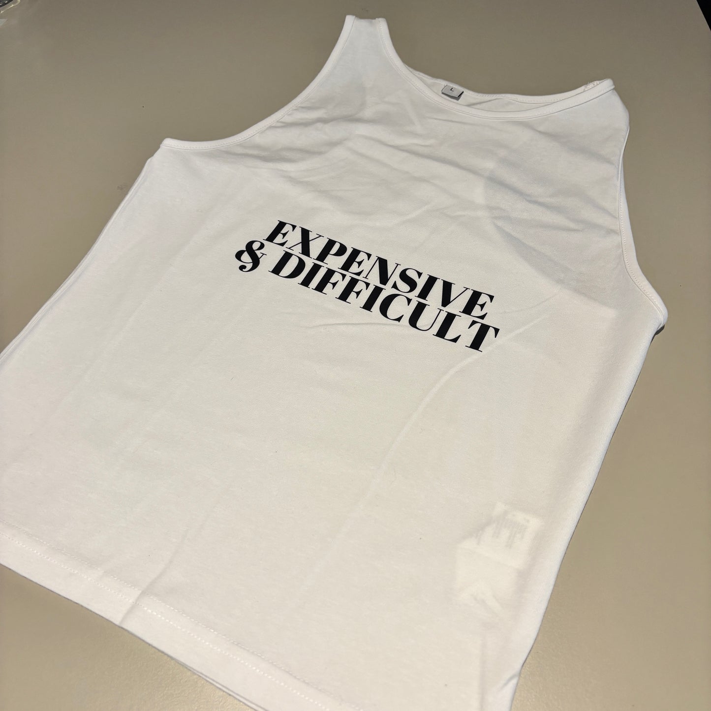 LARGE WHITE TANK TOP (STRETCH) EXPENSIVE & DIFFICULT