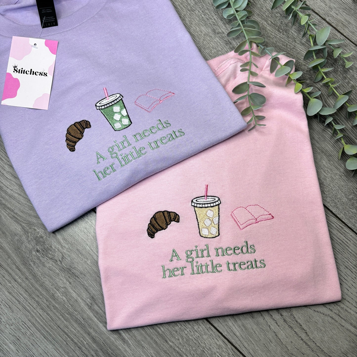 A GIRL NEEDS HER LITTLE TREATS EMBROIDERED SWEATSHIRT