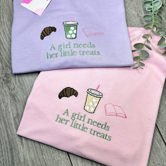 A GIRL NEEDS HER LITTLE TREATS EMBROIDERED T-SHIRT