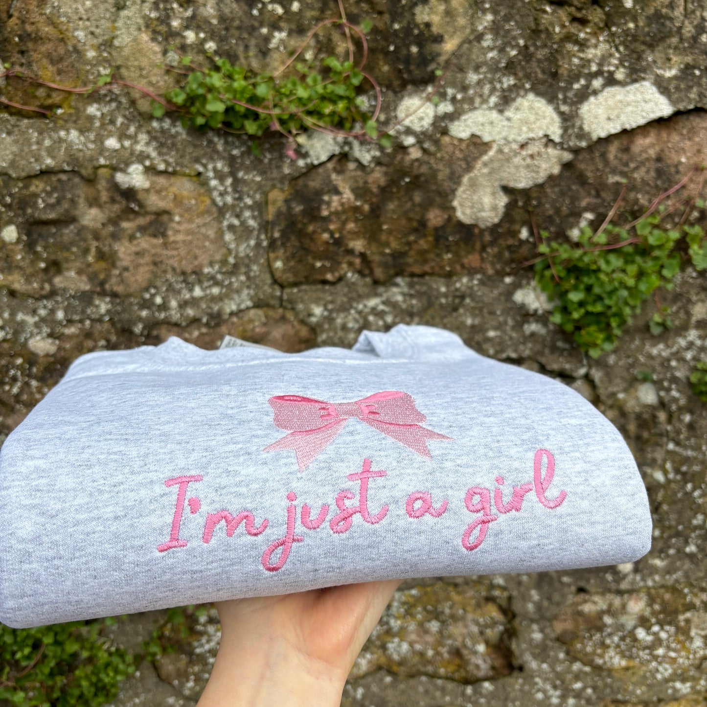 JUST A GIRL EMBROIDERED SWEATSHIRT