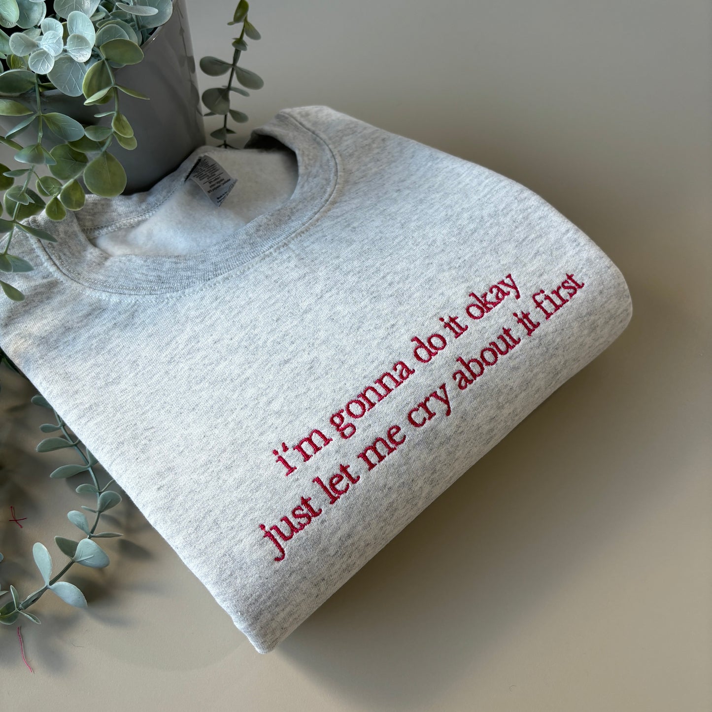 LET ME CRY FIRST EMBROIDERED SWEATSHIRT