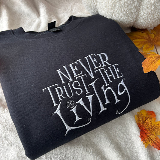 NEVER TRUST THE LIVING EMBROIDERED SWEATSHIRT