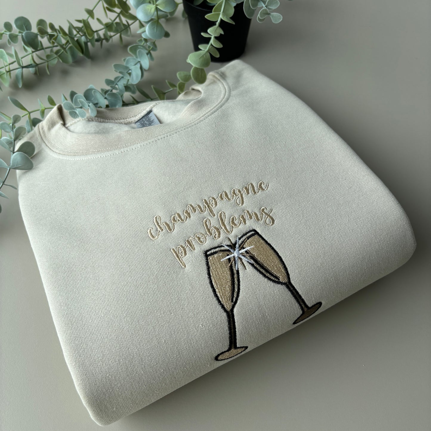 CHAMPAGNE PROBLEMS EMBROIDERED SWEATSHIRT