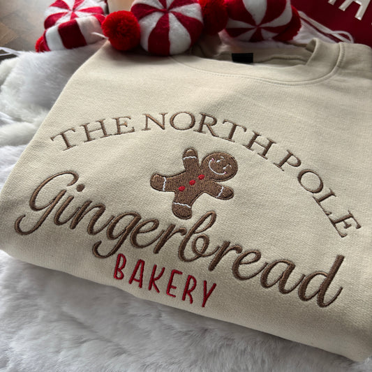 NORTH POLE GINGERBREAD BAKERY EMBROIDERED SWEATSHIRT