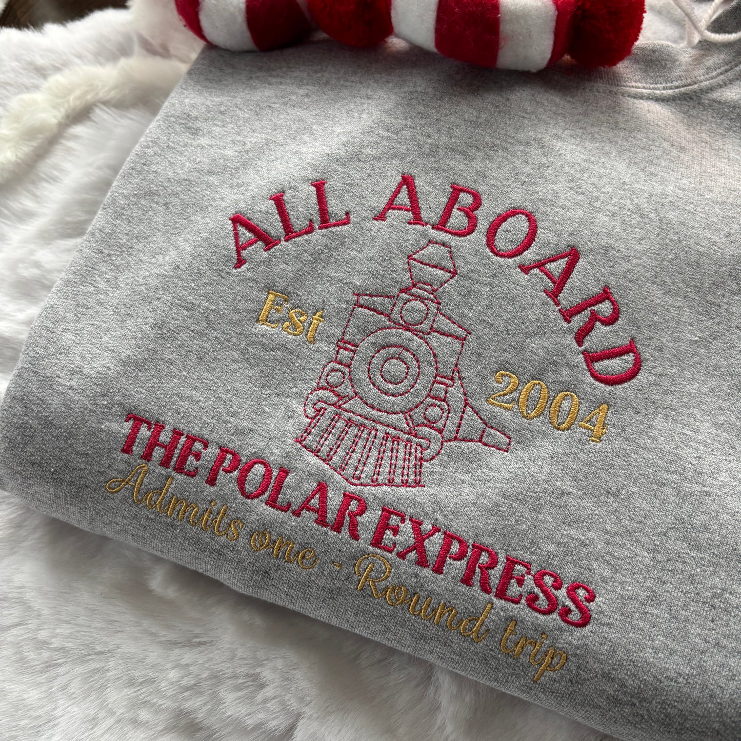 THE POLAR EXPRESS EMBROIDERED SWEATSHIRT