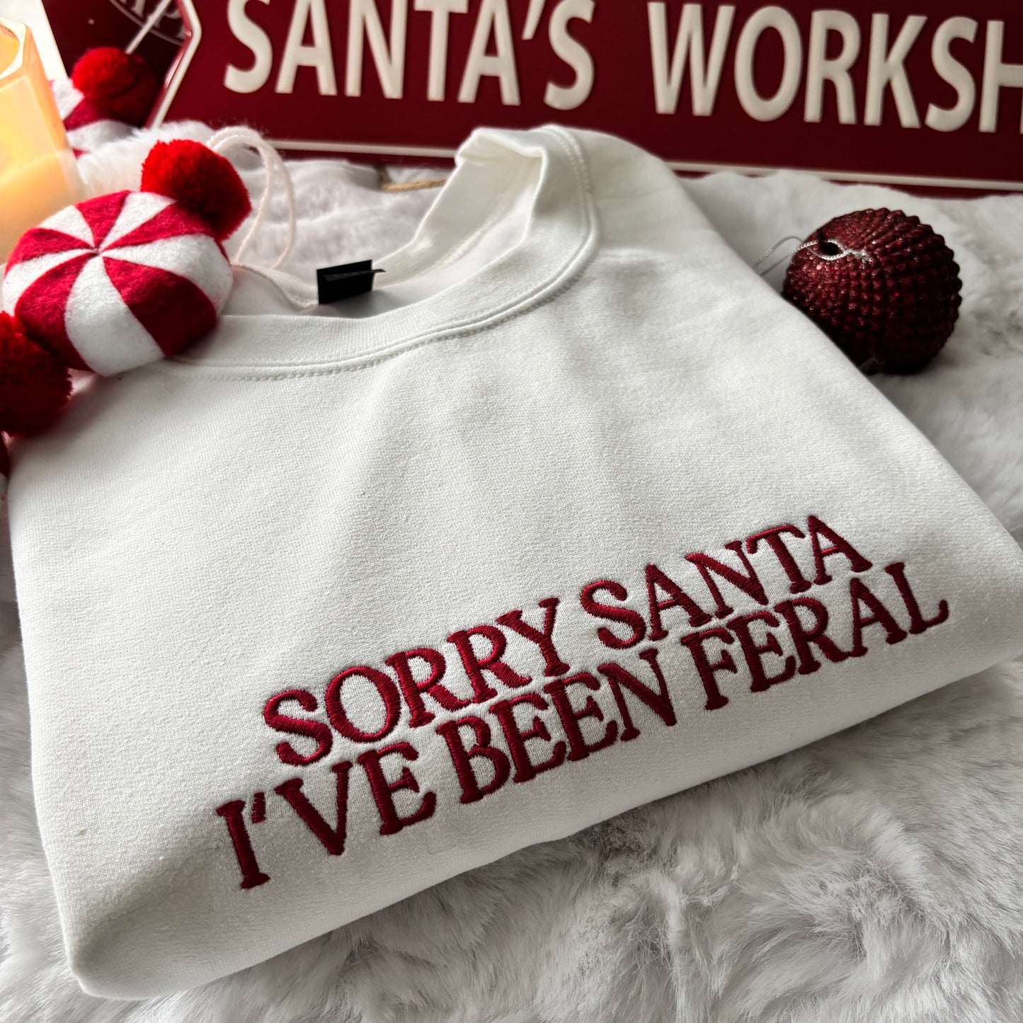 SORRY SANTA I'VE BEEN FERAL EMBROIDERED SWEATSHIRT