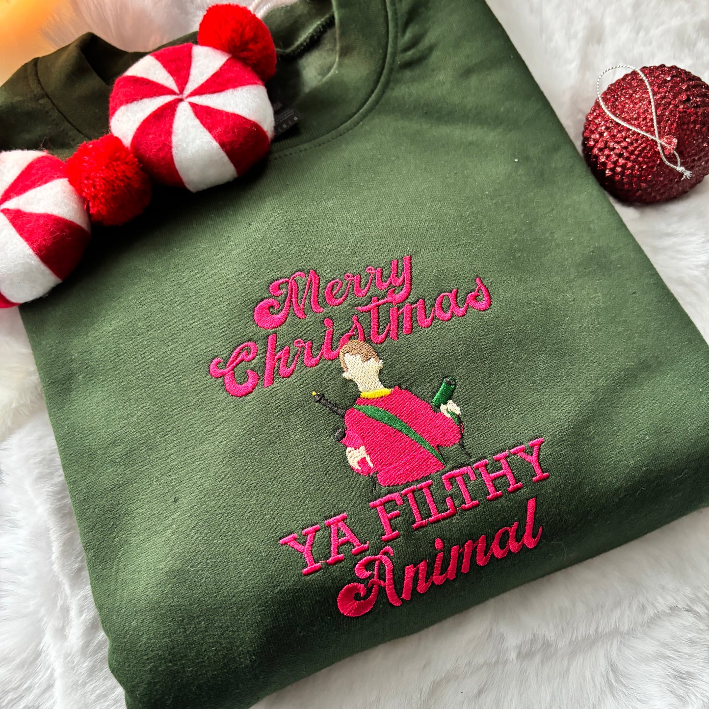 HOME ALONE FILTHY ANIMAL EMBROIDERED SWEATSHIRT