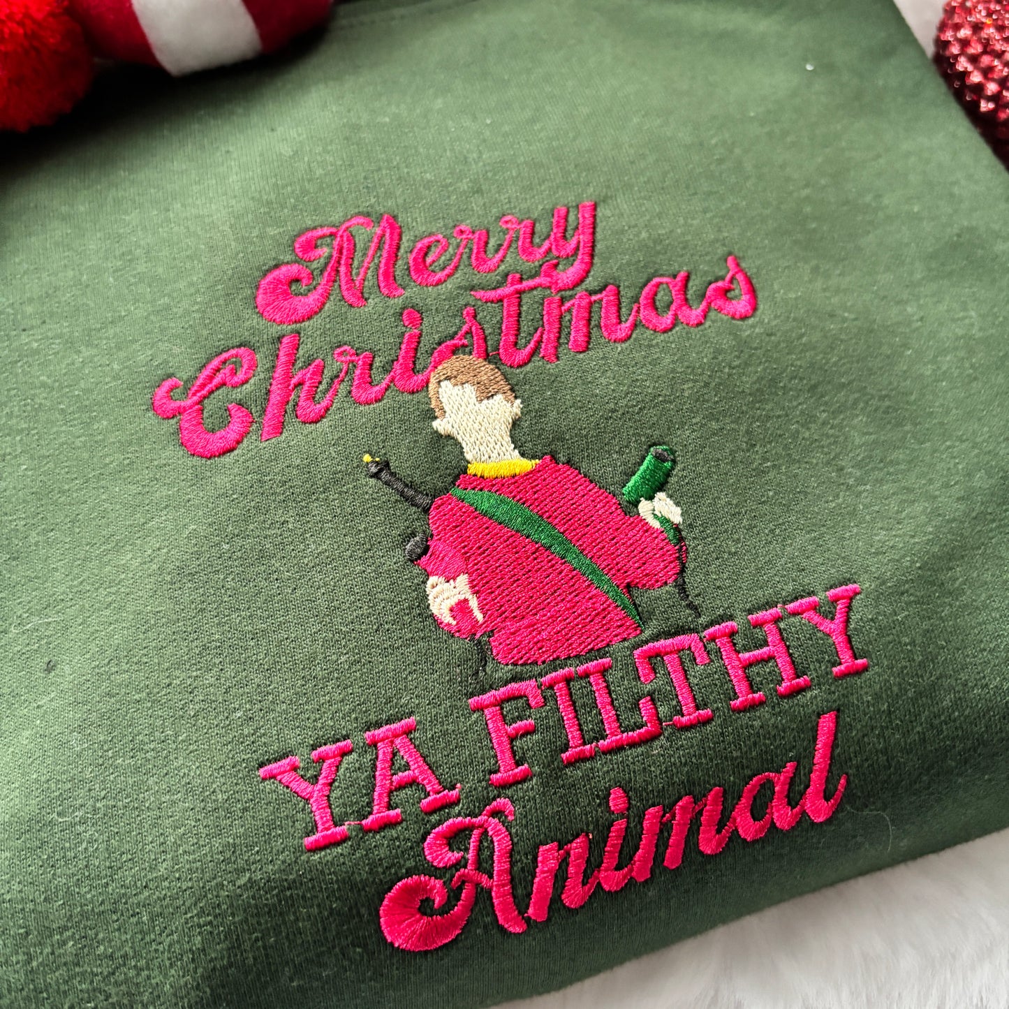 HOME ALONE FILTHY ANIMAL EMBROIDERED SWEATSHIRT