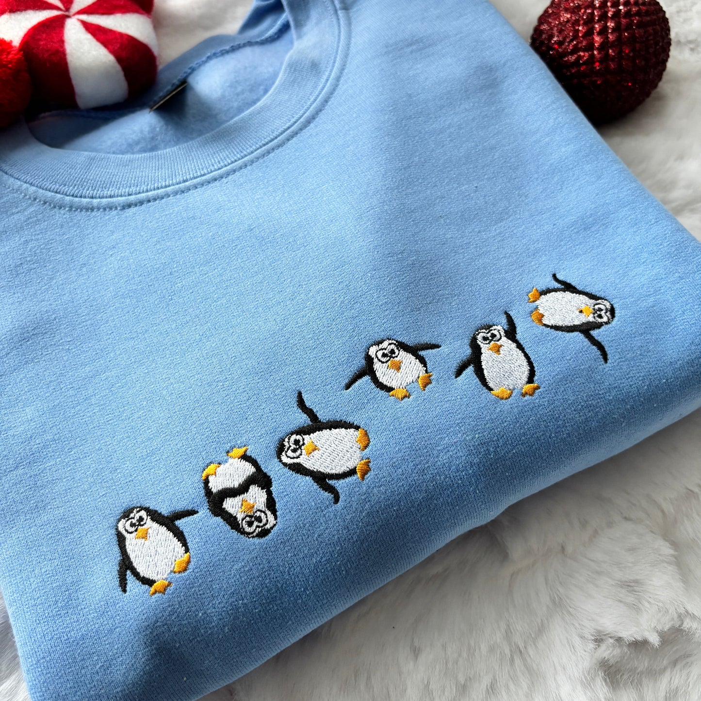 DANCING PENGUINS EMBROIDERED SWEATSHIRT
