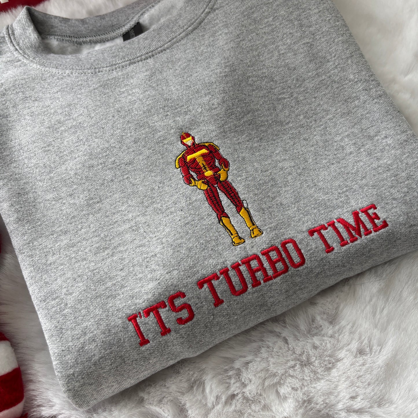 IT'S TURBO TIME JINGLE ALL THE WAY EMBROIDERED SWEATSHIRT