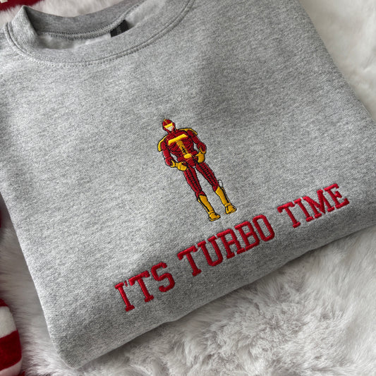 IT'S TURBO TIME JINGLE ALL THE WAY EMBROIDERED SWEATSHIRT