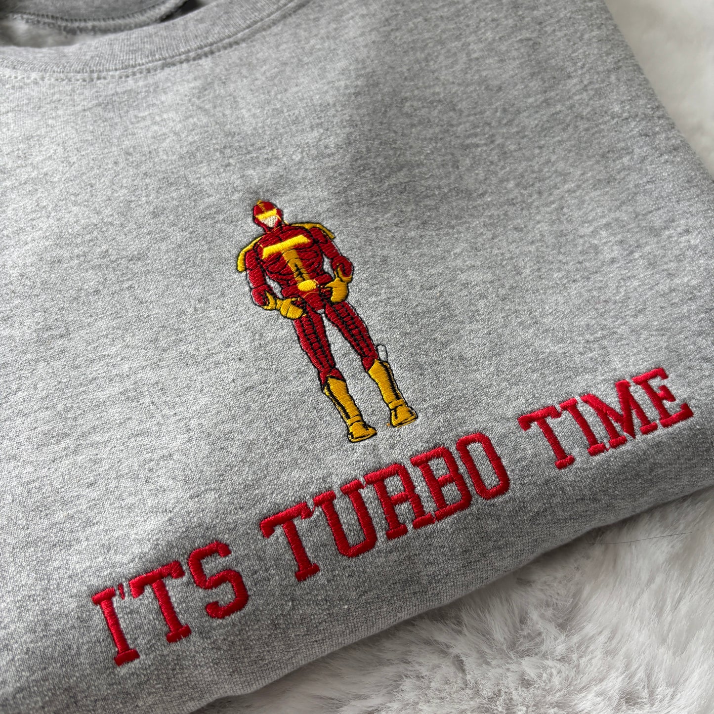 IT'S TURBO TIME JINGLE ALL THE WAY EMBROIDERED SWEATSHIRT