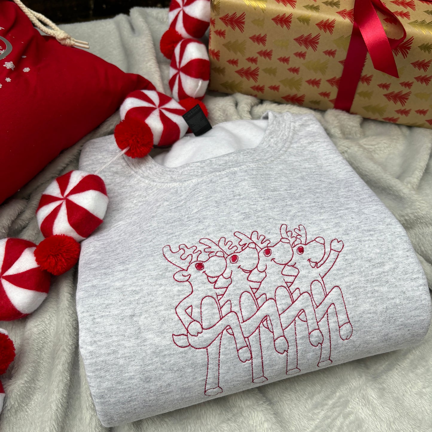 DANCING REINDEER EMBROIDERED SWEATSHIRT