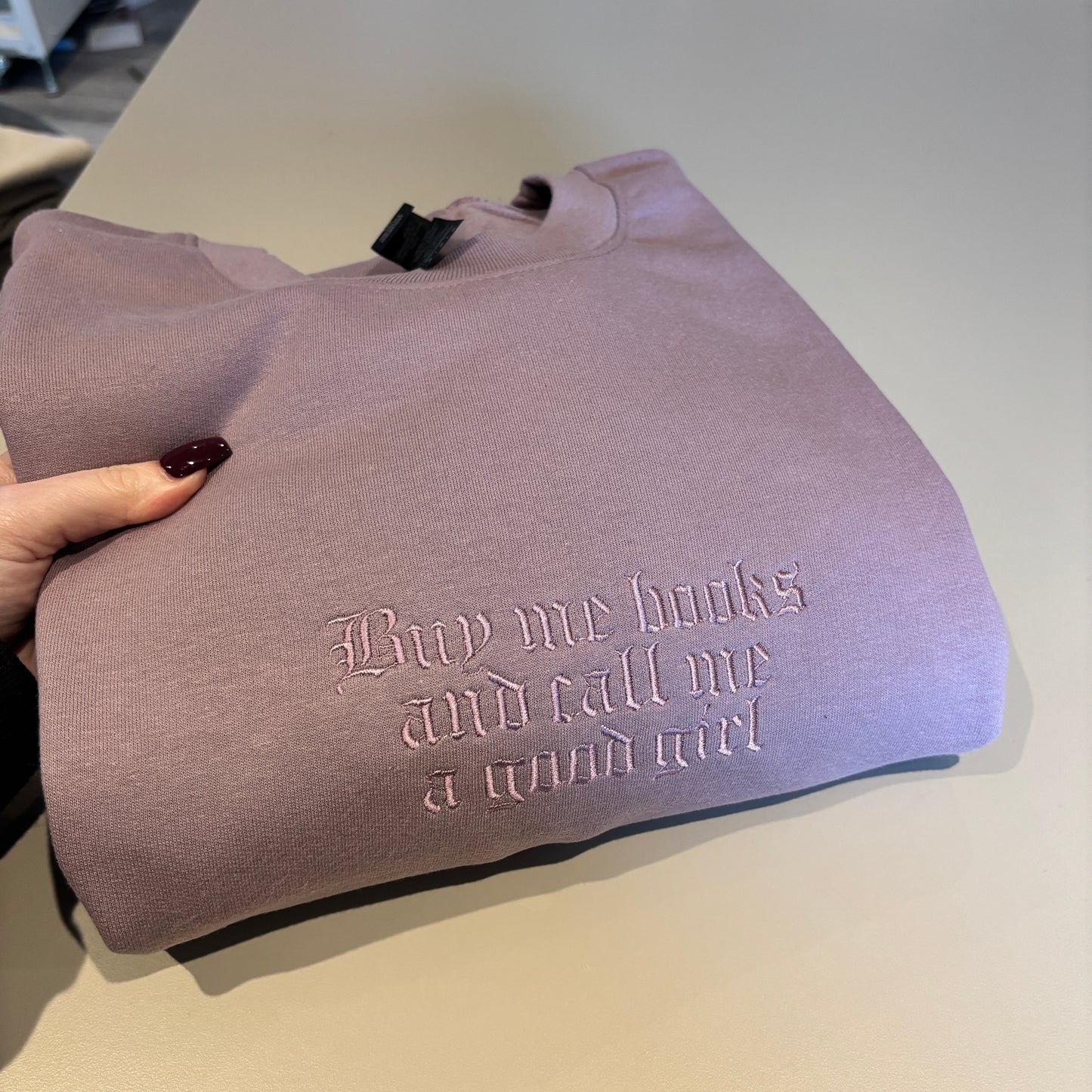 MEDIUM MAUVE BUY ME BOOKS EMBROIDERED SWEATSHIRT *SAMPLE*